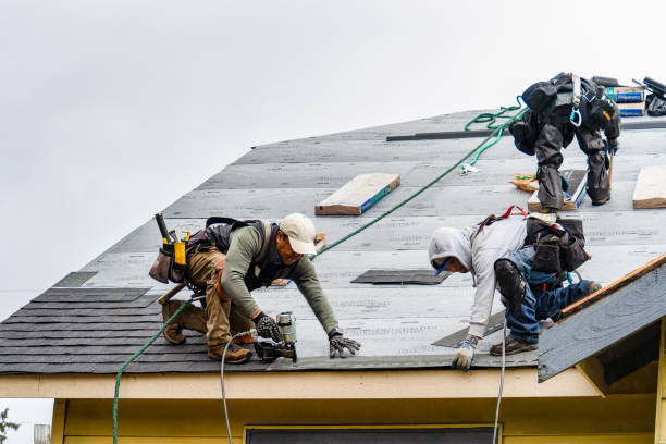 Professional Storm Damage Roof Repair technician working in Sandy Hook, CT